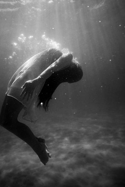 woman submerged in water