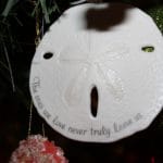 A Memorial Ornament that reads: Those who we love never truly leave us.